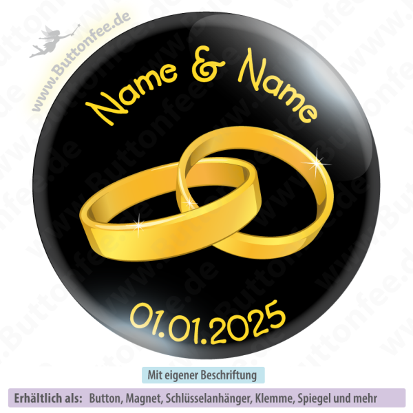 Goldene Hochzeitsringe auf schwarz